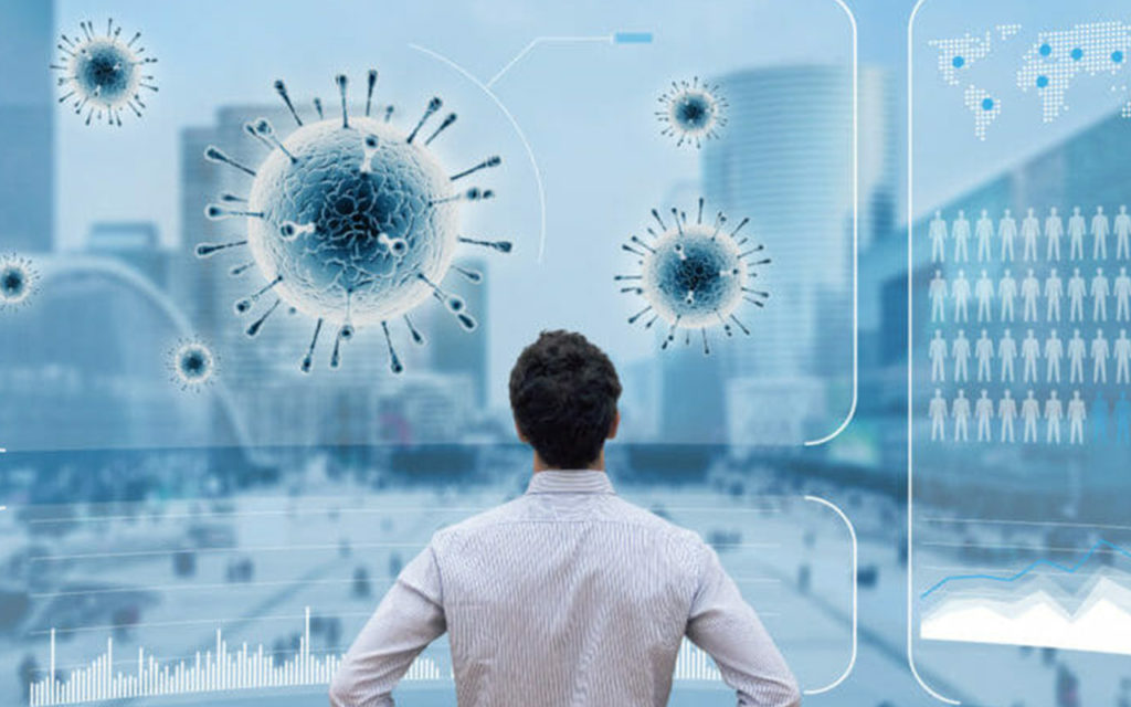 Man watching covid 19 virus on screen