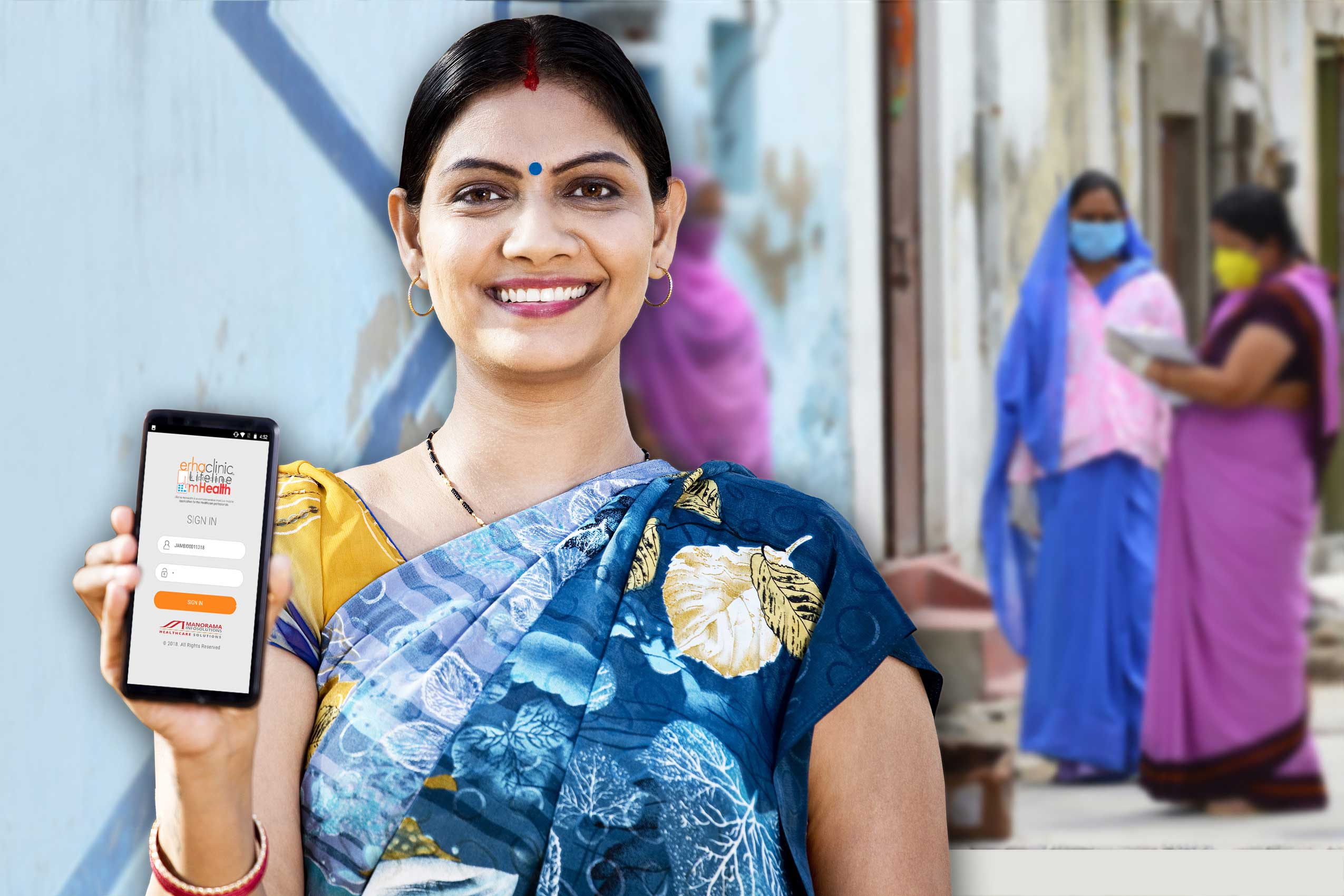 Asha worker is shwoing mobile screen 